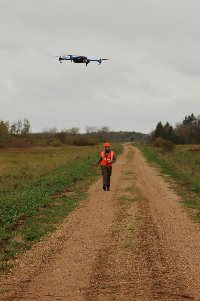 The UAV used in the study (shown above with researcher Mark Ditmer) was a quadcopter drone, relatively small in size compared to other drones. (Image credit: Jessie Tanner)