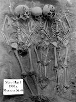 Photo: A shared grave of two half-sisters and an unrelated boy buried at the same time whose remains contained plague DNA; credit: Vladimiri Bazaliiskii