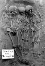 Photo: A shared grave of two half-sisters and an unrelated boy buried at the same time whose remains contained plague DNA; credit: Vladimiri Bazaliiskii